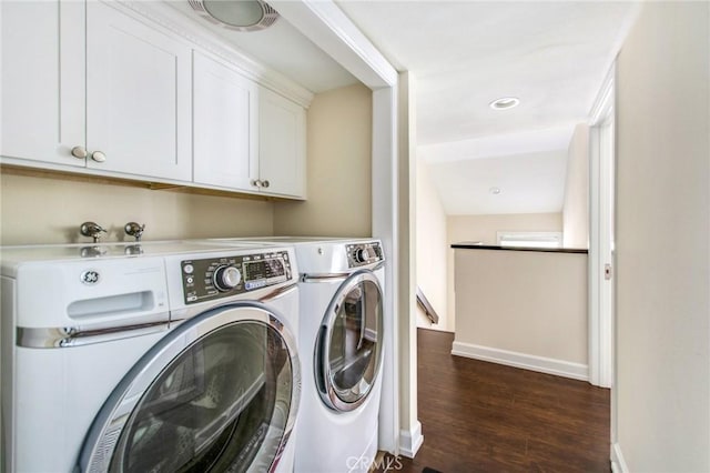 clothes washing area featuring visible vents, baseboards, separate washer and dryer, and dark wood-style floors