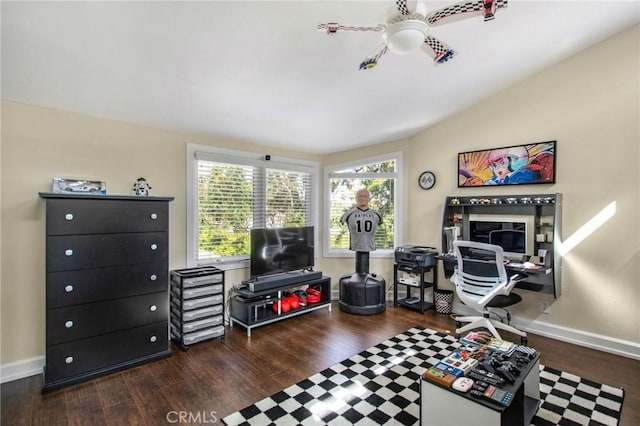 game room with vaulted ceiling, ceiling fan, baseboards, and wood finished floors