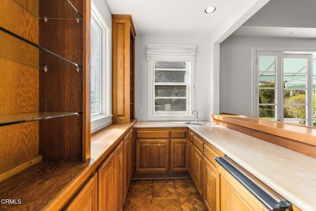 bar featuring dishwasher, a sink, and recessed lighting