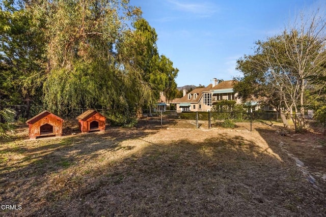 view of yard with fence