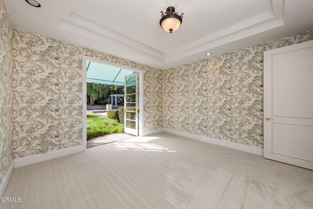 508 W Eucalyptus St, Ojai, CA 93023 - unfurnished room with a tray ceiling, carpet floors, and wallpapered walls
