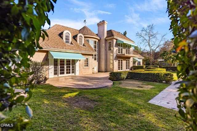 508 W Eucalyptus St, Ojai, CA 93023 - rear view of house featuring stucco siding, a balcony, french doors, a chimney, and a patio