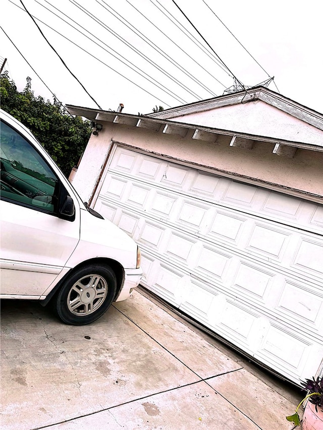 garage with driveway