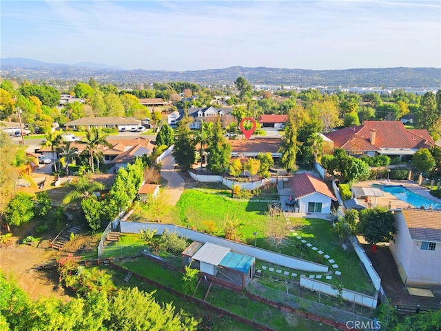 bird's eye view with a residential view and a mountain view