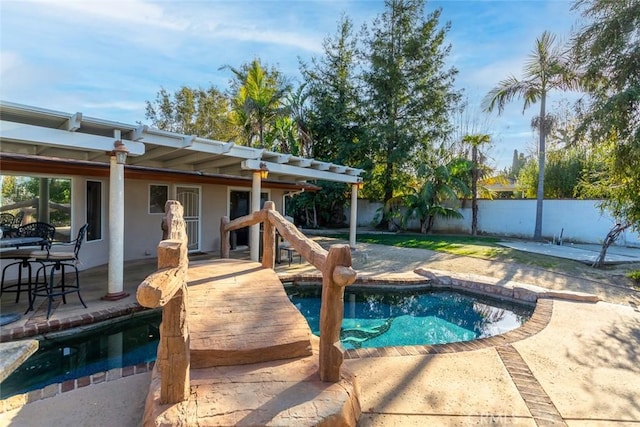 view of pool with a fenced backyard, a fenced in pool, and a patio