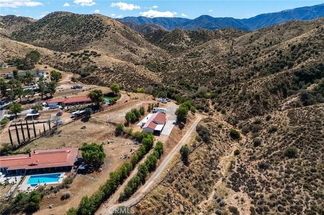 bird's eye view with a mountain view