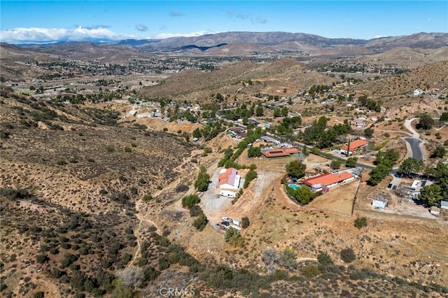 drone / aerial view featuring a mountain view