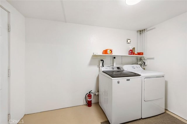 laundry area with laundry area and washer and dryer