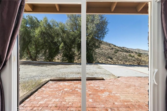 view of patio featuring a mountain view