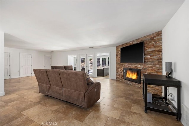 living area featuring a fireplace