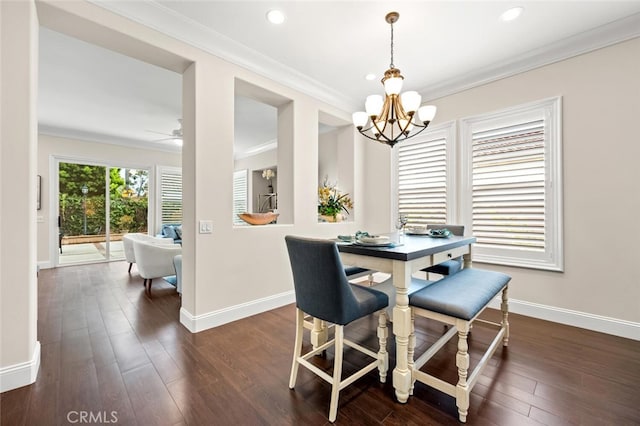 dining room with dark wood-style floors, baseboards, ornamental molding, and recessed lighting