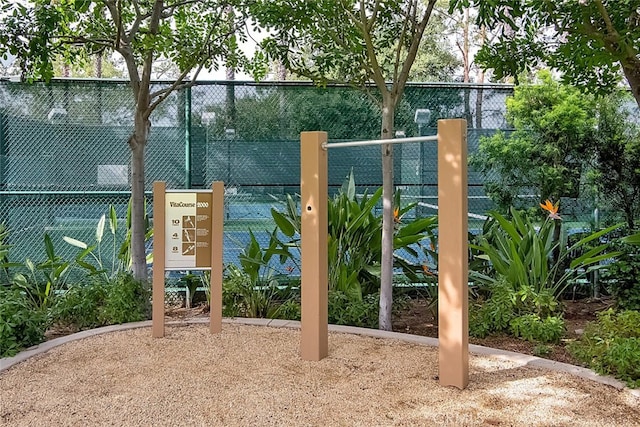 view of playground featuring fence