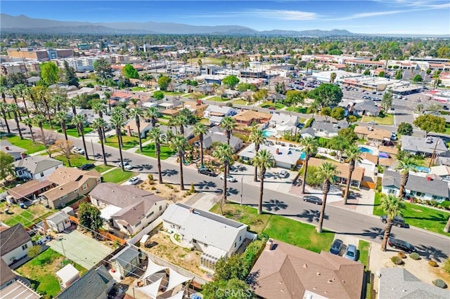 bird's eye view with a residential view and a mountain view