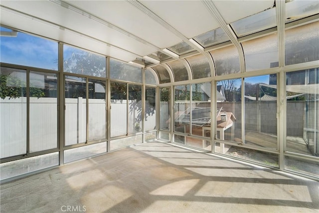 unfurnished sunroom with a healthy amount of sunlight