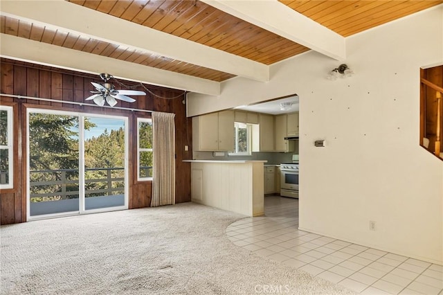27008 Everest Rd, Lake Arrowhead, CA 92352 - kitchen featuring electric stove, wood walls, a ceiling fan, wooden ceiling with exposed beams, and a peninsula