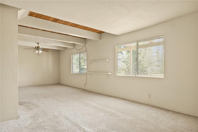 27008 Everest Rd, Lake Arrowhead, CA 92352 - empty room with carpet flooring, beamed ceiling, and a ceiling fan