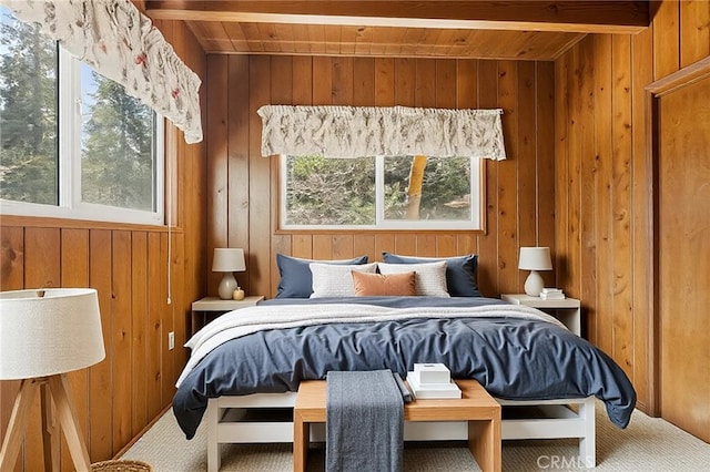 27008 Everest Rd, Lake Arrowhead, CA 92352 - bedroom with multiple windows, wooden walls, wood ceiling, and carpet flooring