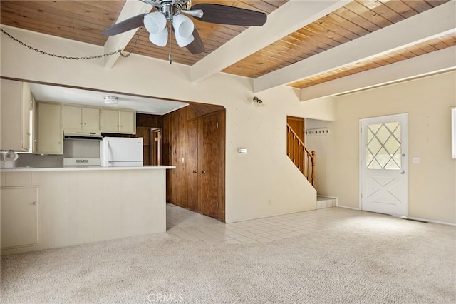 27008 Everest Rd, Lake Arrowhead, CA 92352 - unfurnished living room featuring a ceiling fan, stairs, light colored carpet, and wooden ceiling with exposed beams