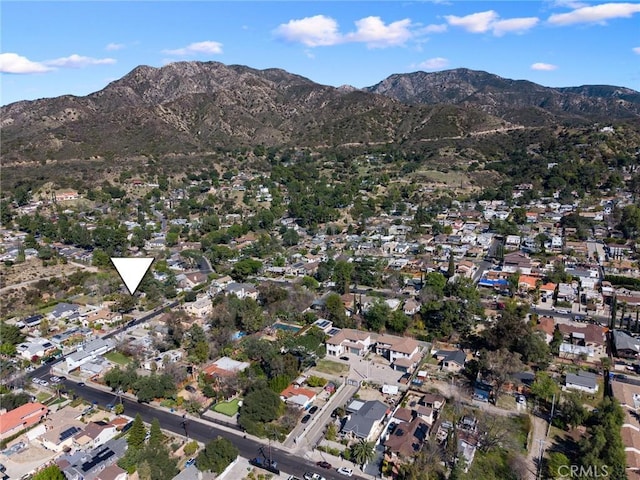 bird's eye view with a residential view and a mountain view