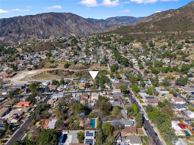 bird's eye view featuring a residential view and a mountain view