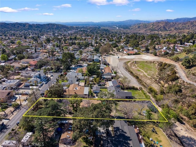 aerial view featuring a residential view and a mountain view