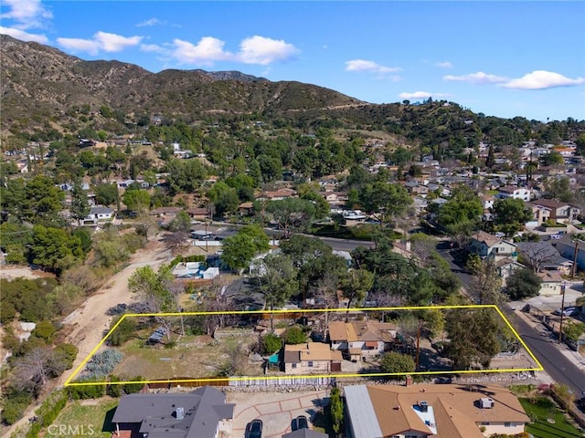 birds eye view of property featuring a residential view and a mountain view