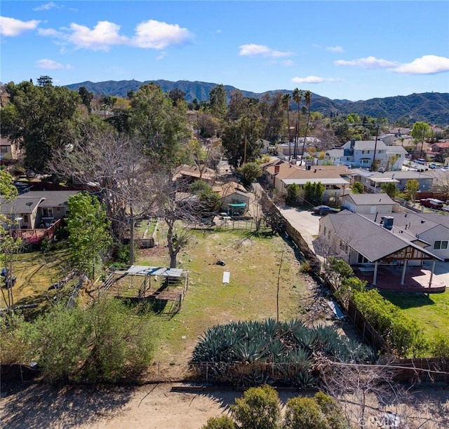 bird's eye view featuring a residential view and a mountain view