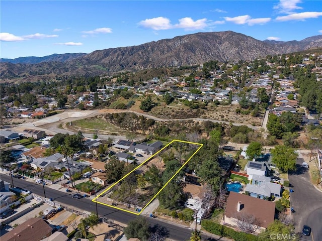 bird's eye view featuring a residential view and a mountain view