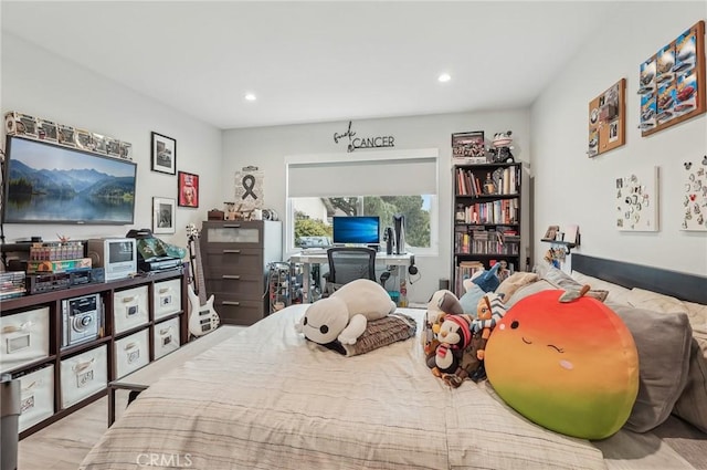 bedroom with recessed lighting