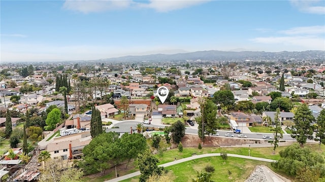 drone / aerial view with a mountain view and a residential view