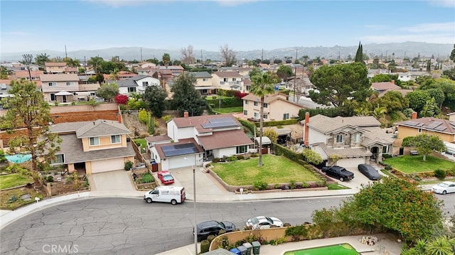 bird's eye view featuring a residential view and a mountain view