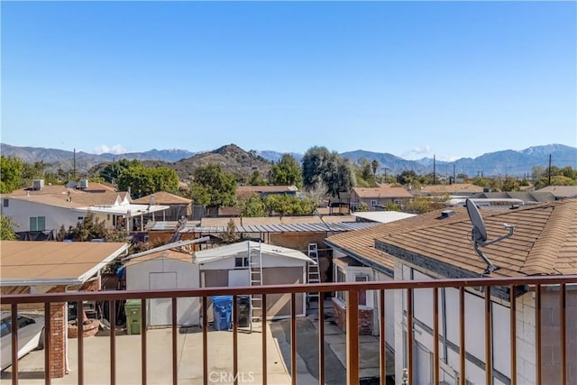 balcony with a mountain view and a residential view