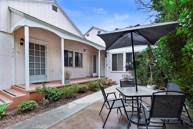 view of patio with outdoor dining area