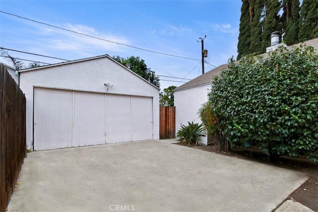 detached garage with fence