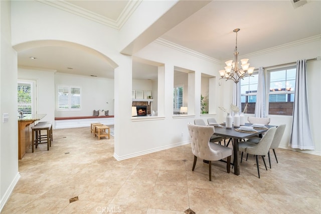 dining area featuring ornamental molding and baseboards