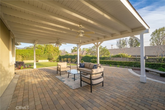 view of patio with a ceiling fan and an outdoor hangout area