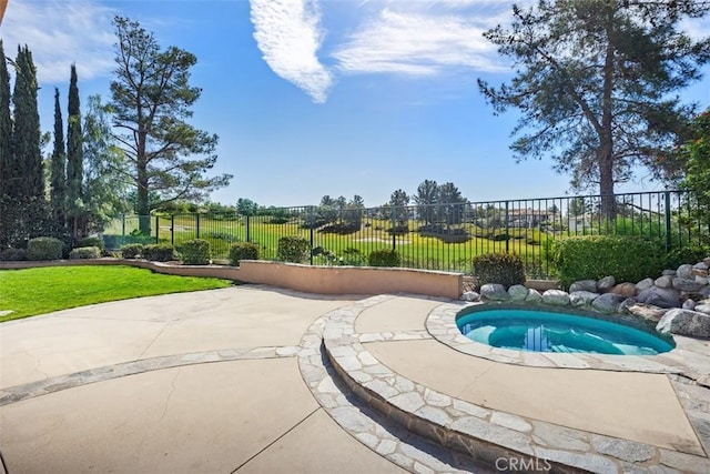 view of swimming pool featuring a patio area and fence