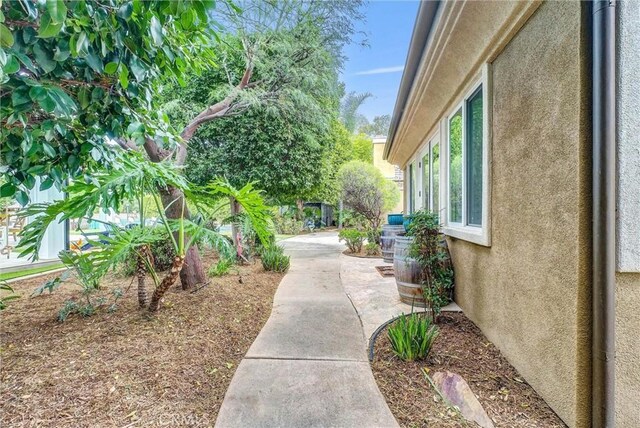 view of property exterior with a patio and stucco siding