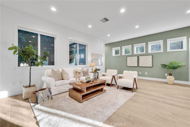 2480 Oak Ave, Corona, CA 92882 - living area with light wood-style flooring, recessed lighting, and baseboards