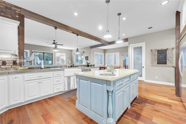 2480 Oak Ave, Corona, CA 92882 - kitchen featuring white cabinets, ceiling fan, light wood finished floors, recessed lighting, and hanging light fixtures