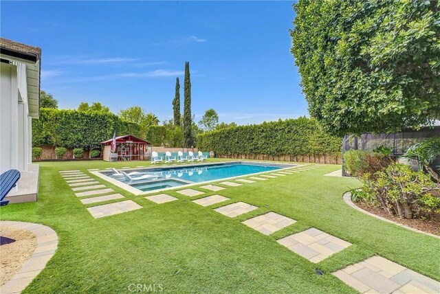 2480 Oak Ave, Corona, CA 92882 - view of swimming pool with a pool with connected hot tub and an outdoor structure