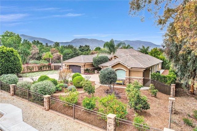 2480 Oak Ave, Corona, CA 92882 - view of front of property featuring stucco siding, driveway, a mountain view, a garage, and a tile roof
