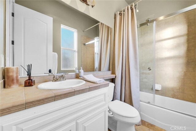 2480 Oak Ave, Corona, CA 92882 - bathroom featuring shower / bath combo, toilet, and vanity