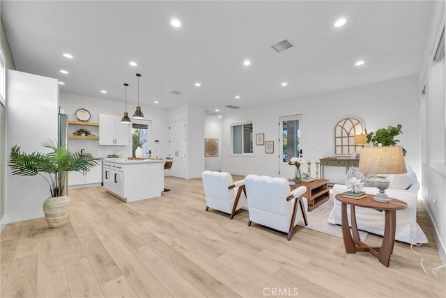 2480 Oak Ave, Corona, CA 92882 - living room with light wood-style flooring and recessed lighting