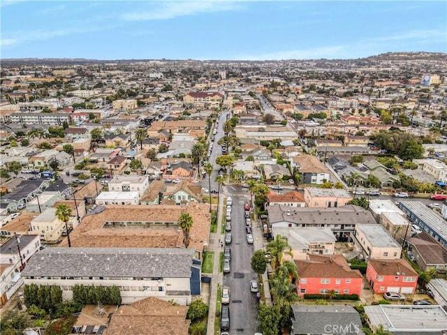 birds eye view of property with a residential view