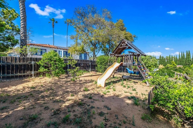 community jungle gym with fence