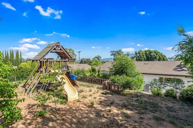 view of play area with fence