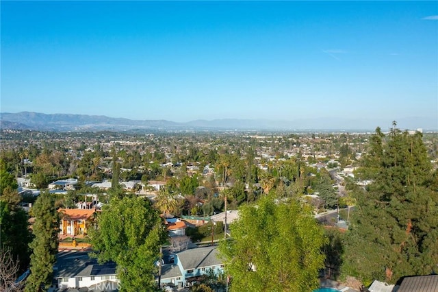 birds eye view of property featuring a mountain view