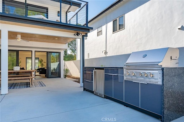 view of patio featuring ceiling fan and area for grilling