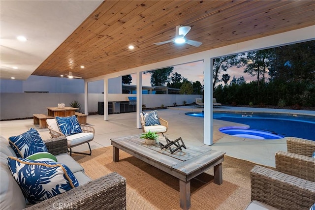 view of swimming pool featuring a ceiling fan